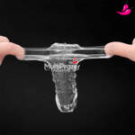 Capa peniana Titan com estimulador de Clitóris